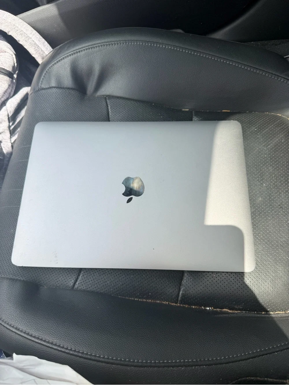 Apple Silver MacBook Laptop with Apple Logo